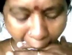Indian AUnty Gives A Blowjob And Receives Cum